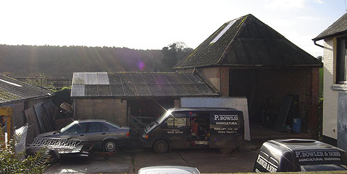 A picture of the Yard at the P Bowler And Sons workshop with lots of vehicles.